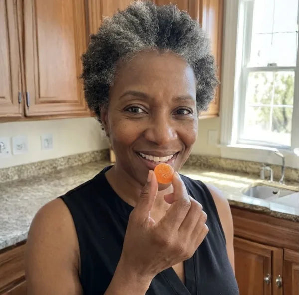 Woman enjoying LyteBites gummy